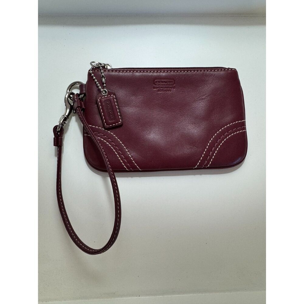 Gorgeous vintage leather Coach wristlet wine colored leather